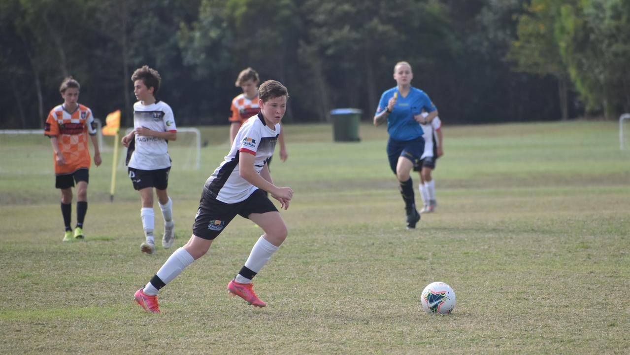Nikolas Lampe in the Whitsundays and Magpies under-15/16s clash at the Mackay football fields, August 21, 2021. Picture: Matthew Forrest
