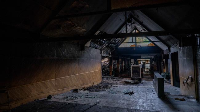 An eerie scene inside the fire-ravaged Stirling Village Shopping Centre. Photo: Naomi Jellicoe