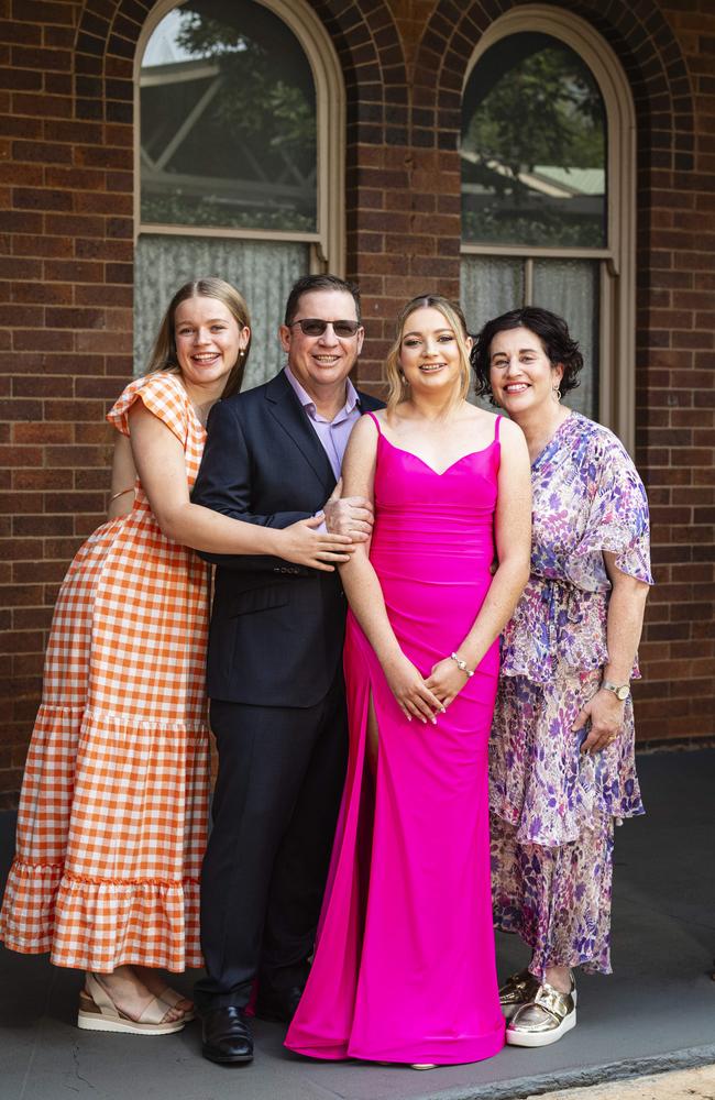 Graduate Claire Matthewson with parents Michael and Leanne and sister Lilah Matthewson as Downlands College year 12 students come together for their valedictory mass at the college, Saturday, November 16, 2024. Picture: Kevin Farmer