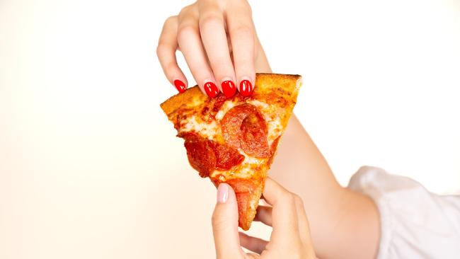 Domino’s is hiring one lucky person to be their “hand” model for their new menu range. Picture: Supplied