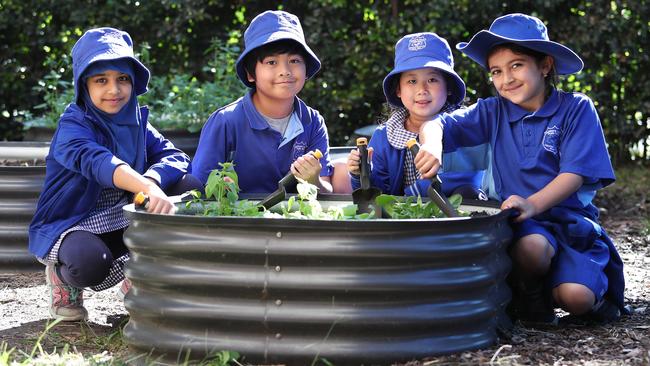 These students are excited to get dressed up in mufti to donate a gold coin for The Daily Telegraph’s Adopt A Farmer campaign. Picture: Brett Costello