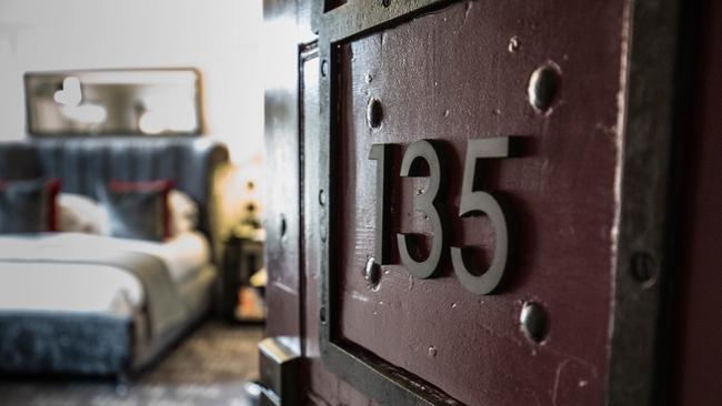 An original jail door opens on to a guestroom at Malmaison, Oxford.