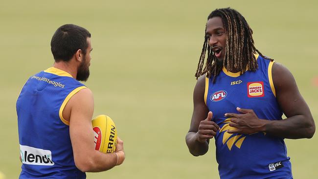 Nic Naitanui, right, with teammate Josh Kenney as the Eagles prepare for the restart. Picture: Paul Kane/Getty Images