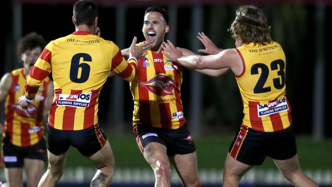 Morphettville Park’s Edward Doak celebrated with teammates Jack Sutto and Kye Dean in their preliminary final win over Walkerville at Glenelg Oval last month. Picture: Dean Martin