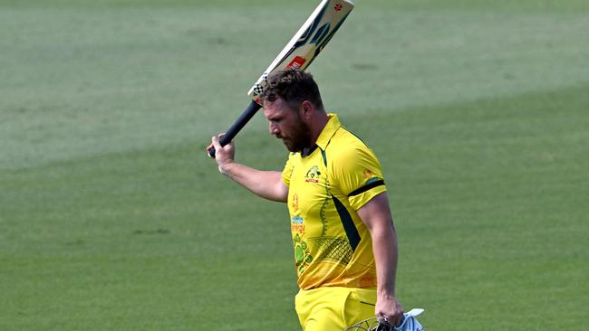 Finch acknowledges the crowd's applause as he walks back to the pavilion following his dismissal. Picture: AFP