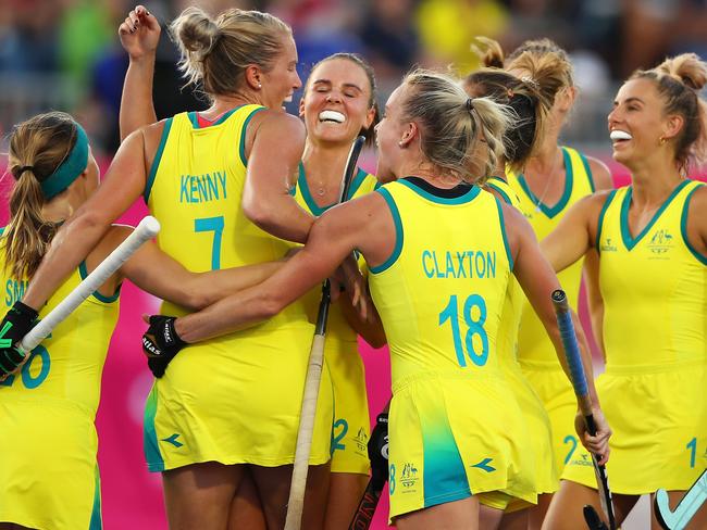 GOLD COAST, QUEENSLAND - APRIL 05: Jodie Kenny of Australia celebrates with her team mates after scoring a goal  during the Pool B Hockey match between Australia and Canada on day one of the Gold Coast 2018 Commonwealth Games at Gold Coast Hockey Centre on April 5, 2018 on the Gold Coast, Australia.  (Photo by Mark Kolbe/Getty Images)