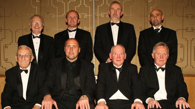 AFL Hall Of Fame at Crown Casino. The Legends that were inducted include: top - Harry Beitzel, Craig Bradley, Robert Walls, and Peter Matera; front - Steve Marsh, Tony Lockett, Darrel Baldock and John Murphy.