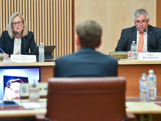 Shadow Minister for Finance Katy Gallagher and Centre Alliance Senator Rex Patrick listen to Secretary to the Treasury Dr Steven Kennedy (C) as he appears before a Senate Inquiry Select Committee on COVID-19. Picture: AAP