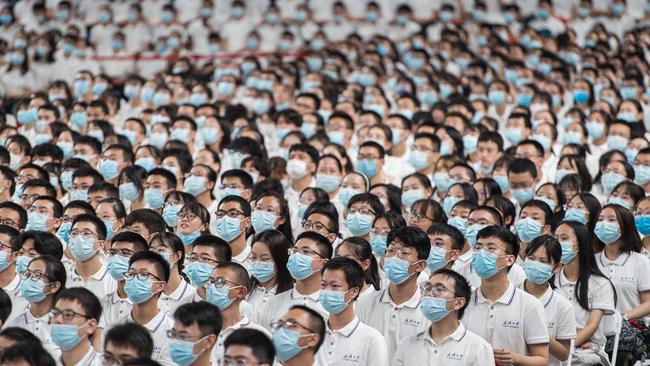 Students at a commencement ceremony on Sunday at Wuhan University in Wuhan, the Chinese city where the pandemic is believed to have started. Picture: AFP