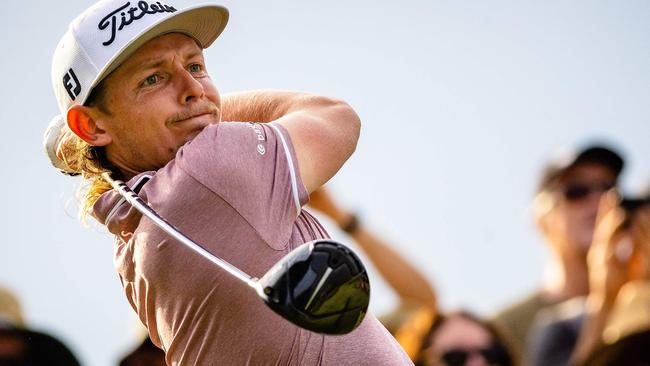 Cameron Smith plays off the 15th tee during his final round victory. Picture: AFP