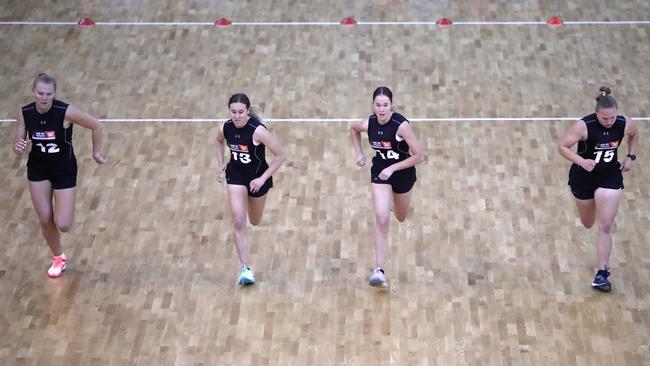 SA’s AFLW draft combine contingent go through the yo-yo endurance test: Montana McKinnon, Hannah Munyard, Madison Newman and Jaimi Tabb at Margaret Court Arena in Melbourne. Picture: DYLAN BURNS/AFL PHOTOS VIA GETTY IMAGES