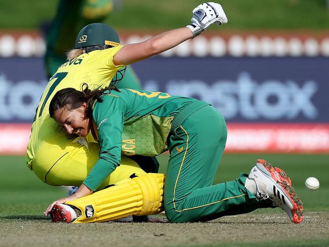 Australia captain Meg Lanning (L) collides with South Africa captain Sune Luus. Picture: Marty Melville/AFP