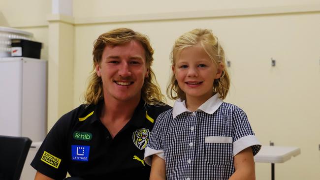 Young Tigers fan meets Richmond star Hugo Ralphsmith