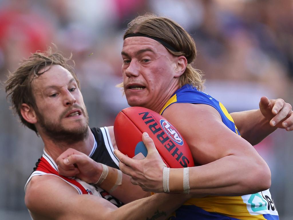 Harley Reid fends off Jimmy Webster. Picture: Paul Kane