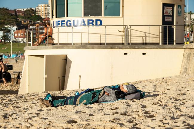 Exhausted after a massive night in Bondi. Picture: Monique Harmer