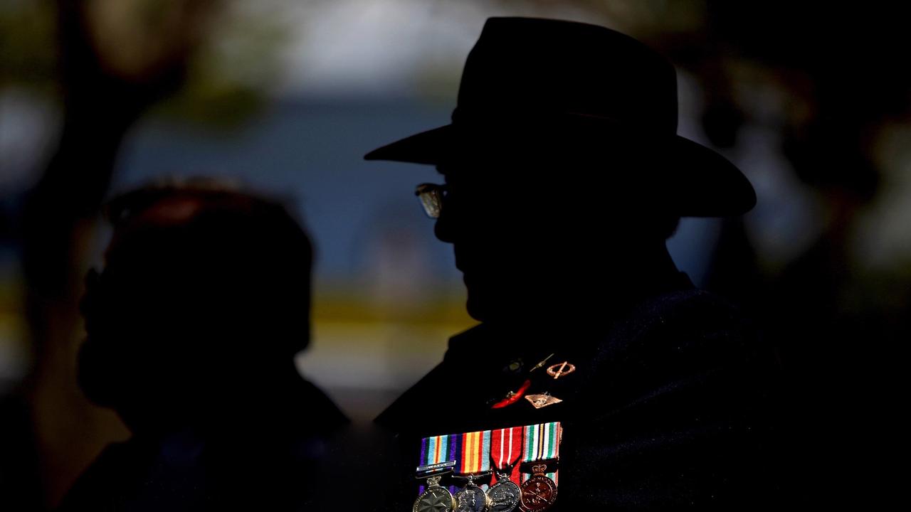 A ray of sunlight lights up the service medals of a retired Army veteren during the 2019 Tweed rememberence day ceremony at Tweed Heads. Photo Scott Powick