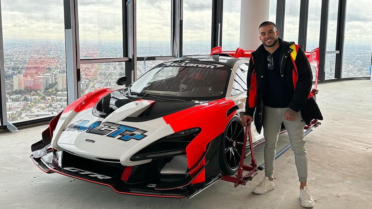 Adrian Portelli (aka Lambo Guy) with his McLaren Senna GTR 57 which he got lifted by crane into his Melbourne hi-rise apartment. Picture: Instagram