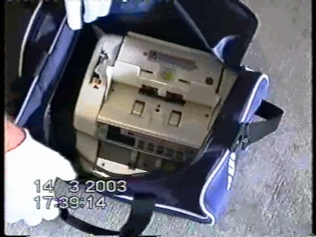 Video grab of police evidence photo showing a money counting machine, March 2003. Picture: Supplied