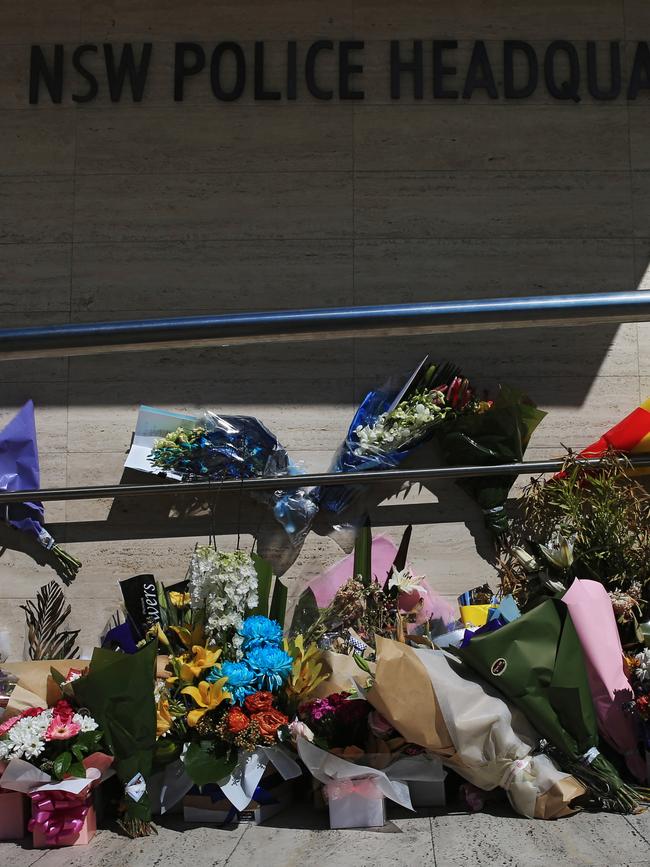 Flowers outside NSW Headquarters, a week after Curtis Cheng was shot dead. Picture: Toby Zerna.