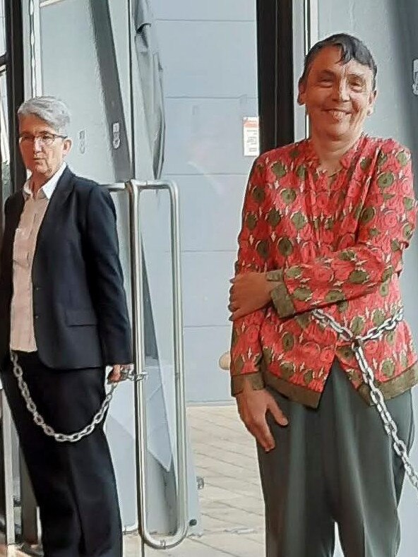 Two protesters chained themselves to doors at the conference in October, 2022. Picture: Facebook