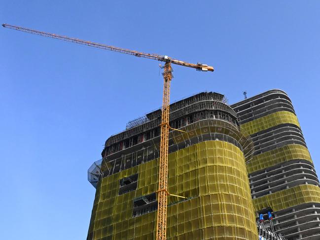 An apartment building under construction is seen in Colombo on January 29, 2020. (Photo by ISHARA S. KODIKARA / AFP)