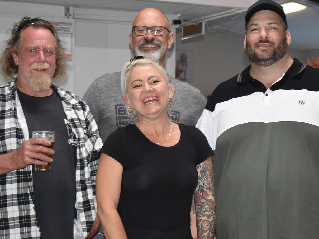 Wayne Strawchan, Lyndon Struckle, Nicholas Amos and bartender Carla-Anne Blackburn at O'Shea's Hotel Walkerston less than 48 hours after Nicholas Amos was shot in an alleged carjacking gone wrong. Picture: Lillian Watkins