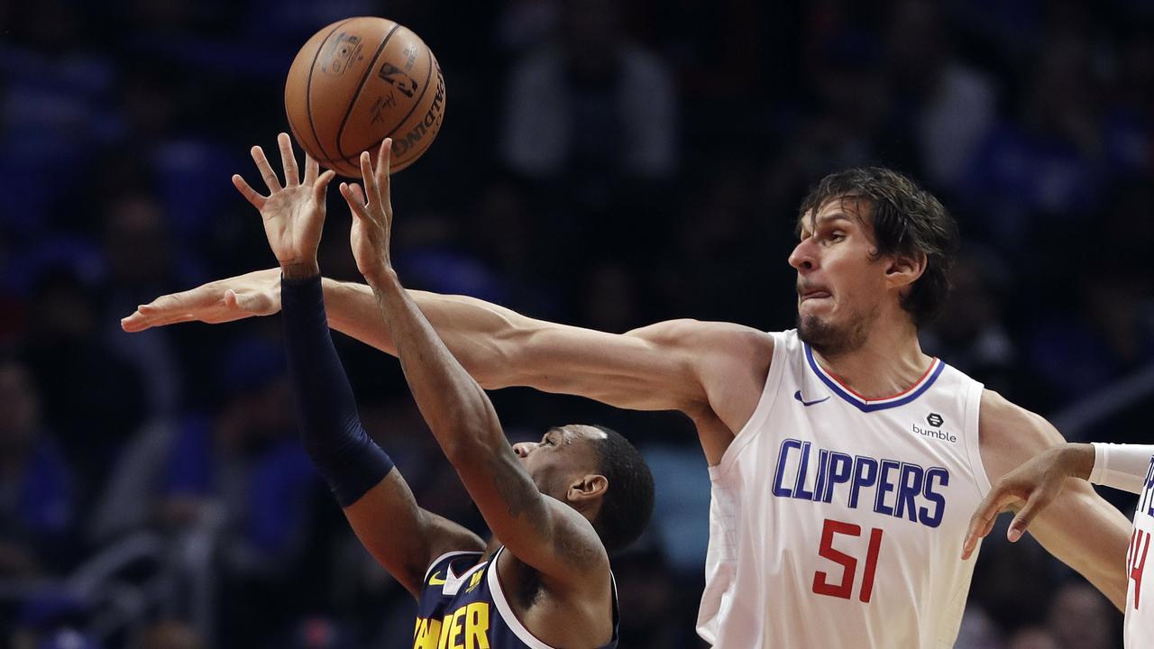 Boban Mania: Marjanovic jumps into NBA with both feet – and lands dunking  on someone - NBC Sports