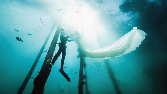 Jack and Jessica Alderman at Port Noarlunga for their "wreck the dress" shoot. Picture: SvenStudios