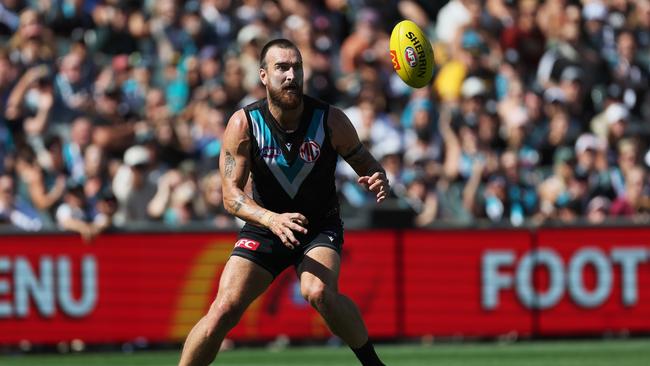 ADELAIDE, AUSTRALIA – MARCH 17: Charlie Dixon of the Power controls the ball during the 2024 AFL Round 01 match between the Port Adelaide Power and the West Coast Eagles at Adelaide Oval on March 17, 2024 in Adelaide, Australia. (Photo by James Elsby/AFL Photos via Getty Images)