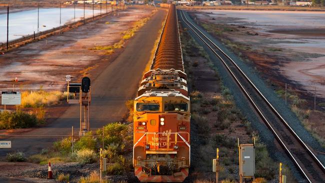 A BHP freight train carries Australian iron ore to port for what could be a sea trip to China. Picture: Bloomberg