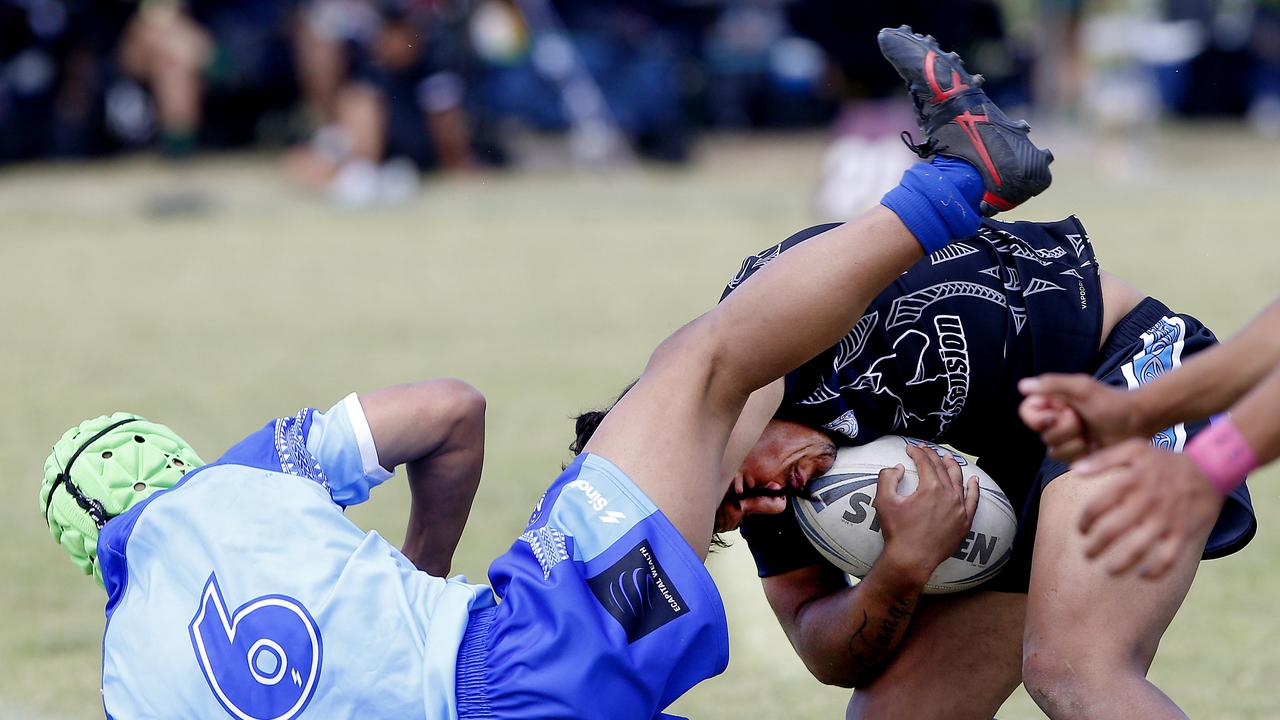 Tuao Tamielu from Samoa white and Amari-Jay Tangi from Maori Pango. Under 16 Boys Maori Pango v Samoa white. Harmony Nines Rugby League. Picture: John Appleyard