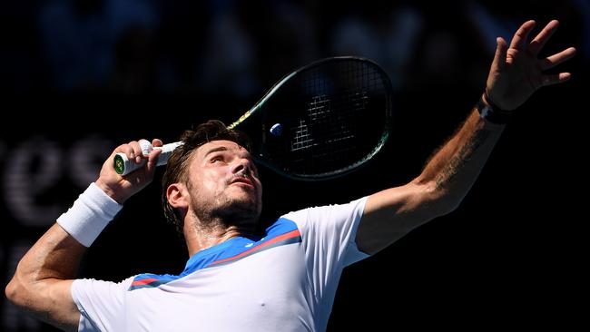 Stan Wawrinka of Switzerland serves it up to Alexander Zverev. Picture: Hannah Peters/Getty