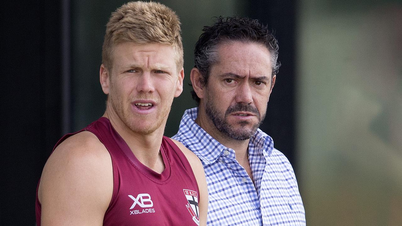 Dan Hannebery, flanked by football boss Simon Lethlean, watched on at Moorabbin on Thursday as he continues to battle a hamstring issue. Picture: Michael Klein