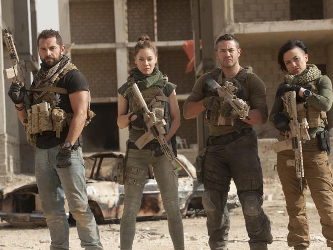 Daniel MacPherson, Roxanne McKee, Warren Brown, and Alin Sumarwata in Strike Back. Picture: Liam Daniel