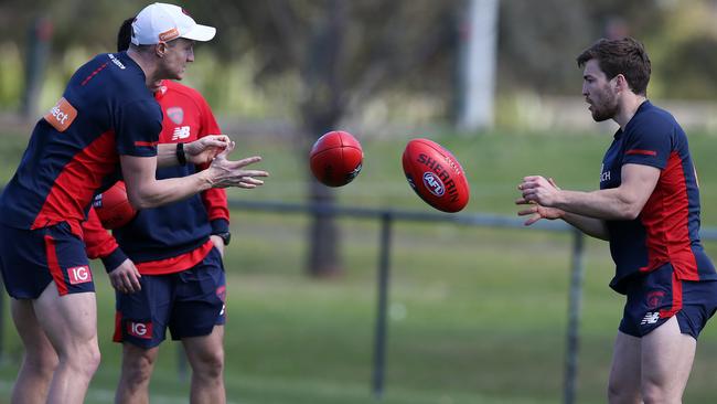 Aaron vandenBerg trains with Melbourne vice-captain Jack Viney away from Melbourne’s main group.