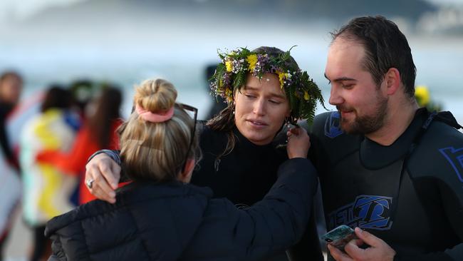 GOLD COAST, AUSTRALIA - JULY 11: Alex Pullin's girlfriend Ellidy Vlug is supported by family and friends in memory of Alex 'Chumpy' Pullin on July 11, 2020 in Gold Coast, Australia. Australian Winter Olympic Games Snowboarder Alex 'Chumpy' Pullin died on Wednesday 8 July in a drowning accident while spearfishing at Palm Beach on the Gold Coast, aged 32. (Photo by Chris Hyde/Getty Images)