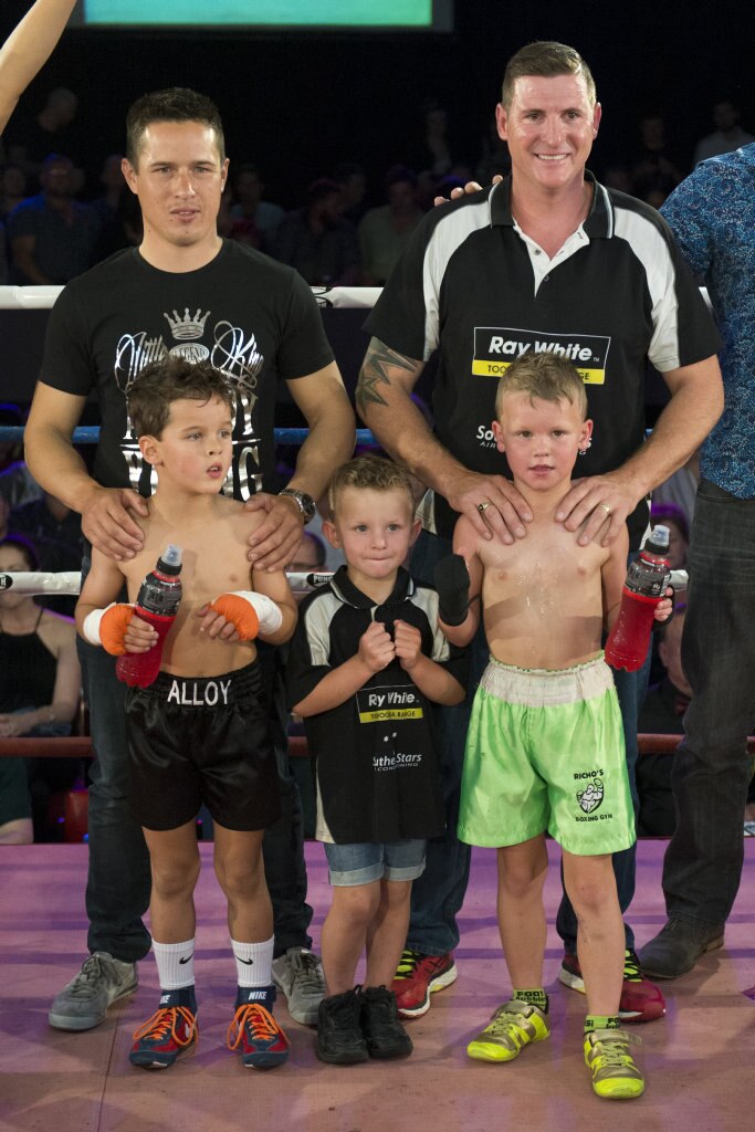 Fundraising bout participants Adrian Young (left) with dad Will Young and Junior Richards with his dad Brett Richards at Smithy and TGW Bring The Big Fights 14 at Rumours International, Saturday, October 22, 2016. Picture: Kevin Farmer