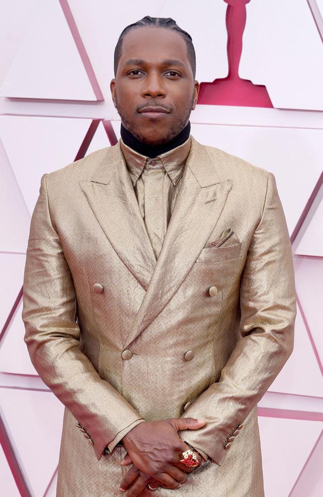 One Night in Miami star Leslie Odom Jr. in a double-breasted Brioni suit with Cartier jewellery. Picture: AFP