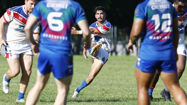 Ivanhoes' Rhylee Herd kicks the ball against Innisfail Leprechauns. Picture: Brendan Radke