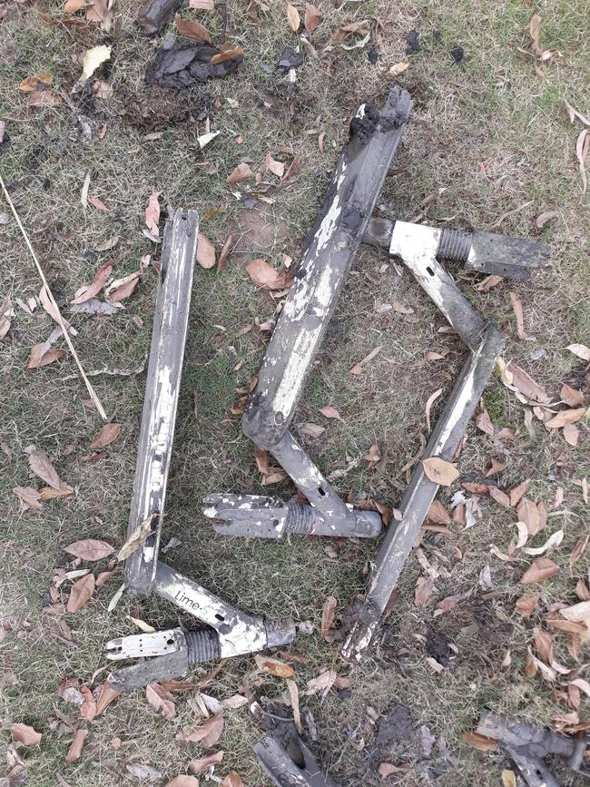 The dumped and stripped Lime e-scooters found in the Brisbane River at Fig Tree Pocket.