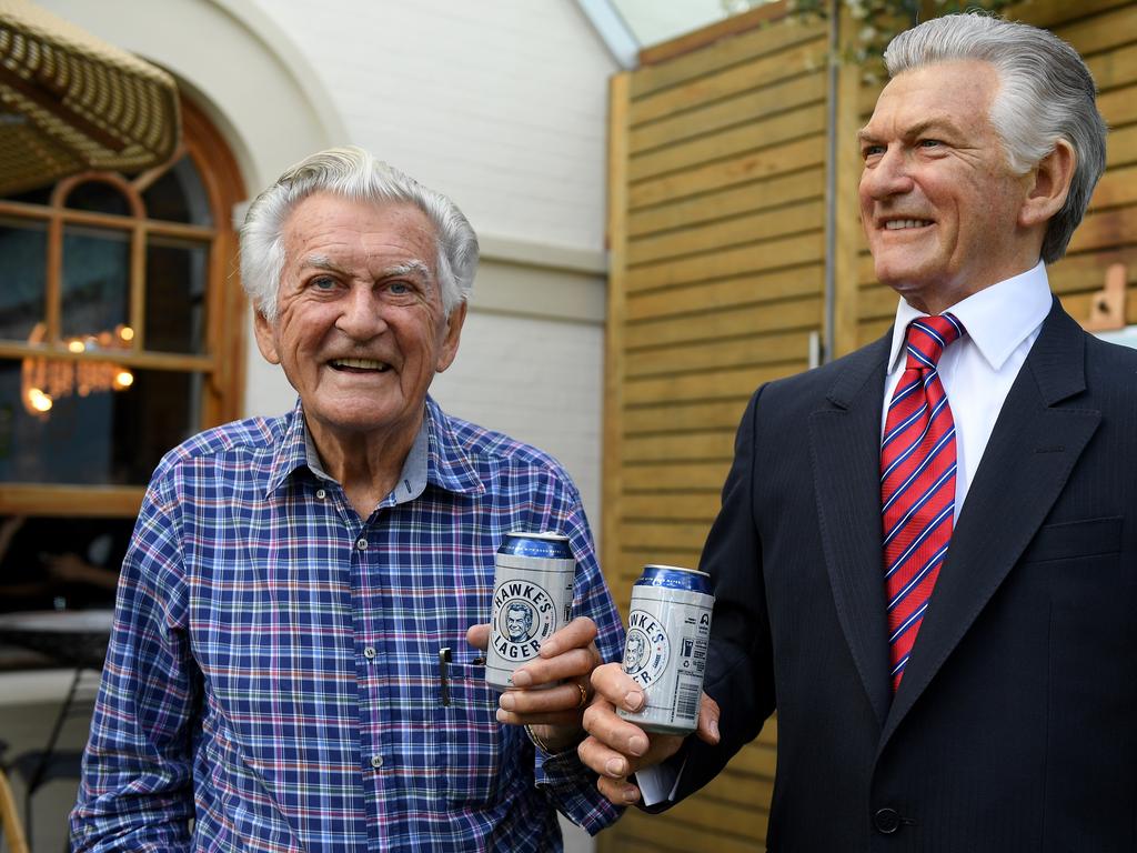 Former prime minister Bob Hawke poses for a photograph with a wax figure of himself at a media event to celebrate his 88th birthday, in Sydney, Thursday, December 7, 2017. Mr Hawke was presented with a wax sculpture of himself holding a can of Hawkes Brewing Co. beer. Picture: Dan Himbrechts