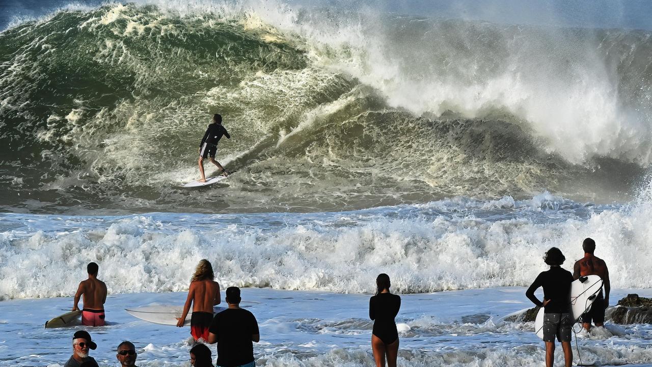 Surfers at Snapper Rocks enjoy the large swell, strong winds and big waves caused by ex-Tropical Cyclone Seth. Picture: Lyndon Mechielsen/The Australian