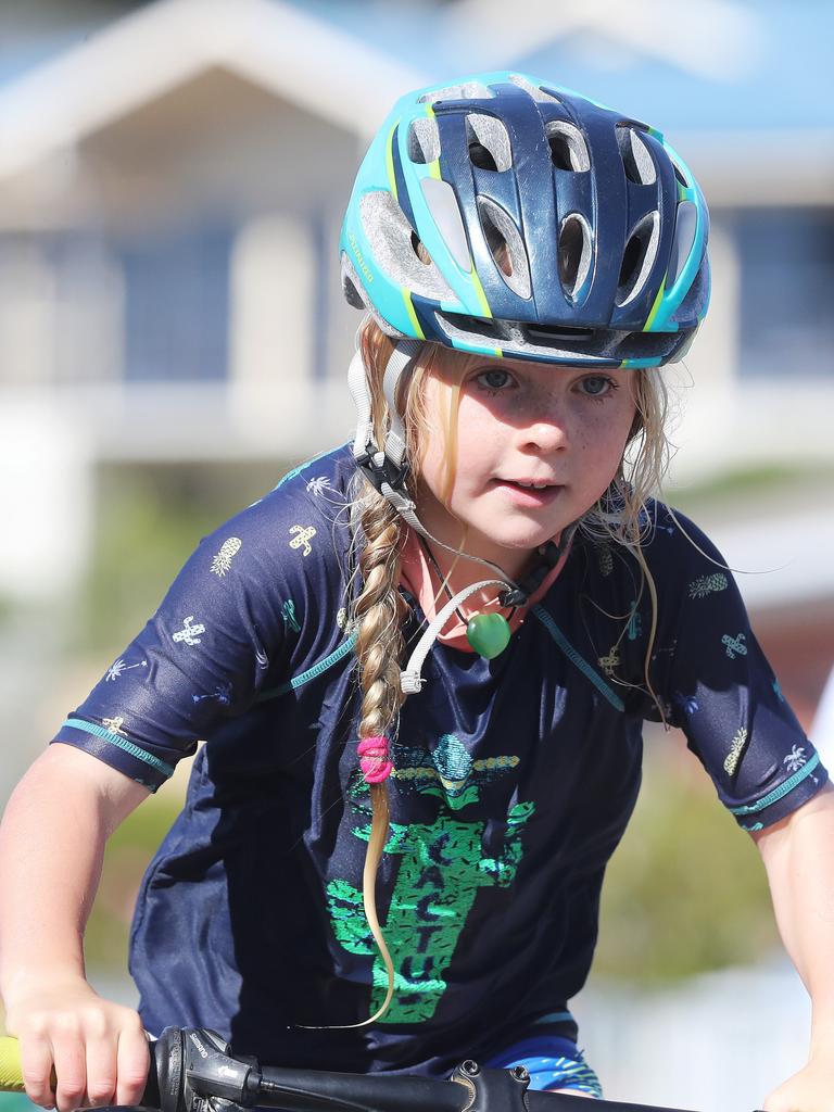 Participants competing in the Bupa KidFit Series triathlon beginning their cycling leg at Blackmans Bay Beach. Picture: LUKE BOWDEN