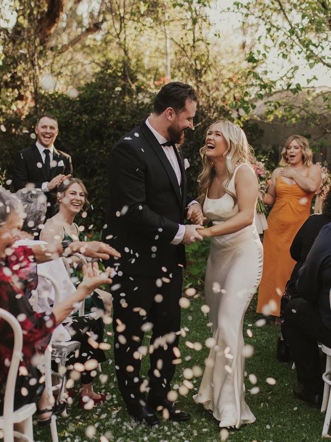 Niav Andrews and Andy Whitehead wanted to be a sustainable wedding a thrifted a lot of their items – including Niav’s dress. Picture: Good Lovin Photography