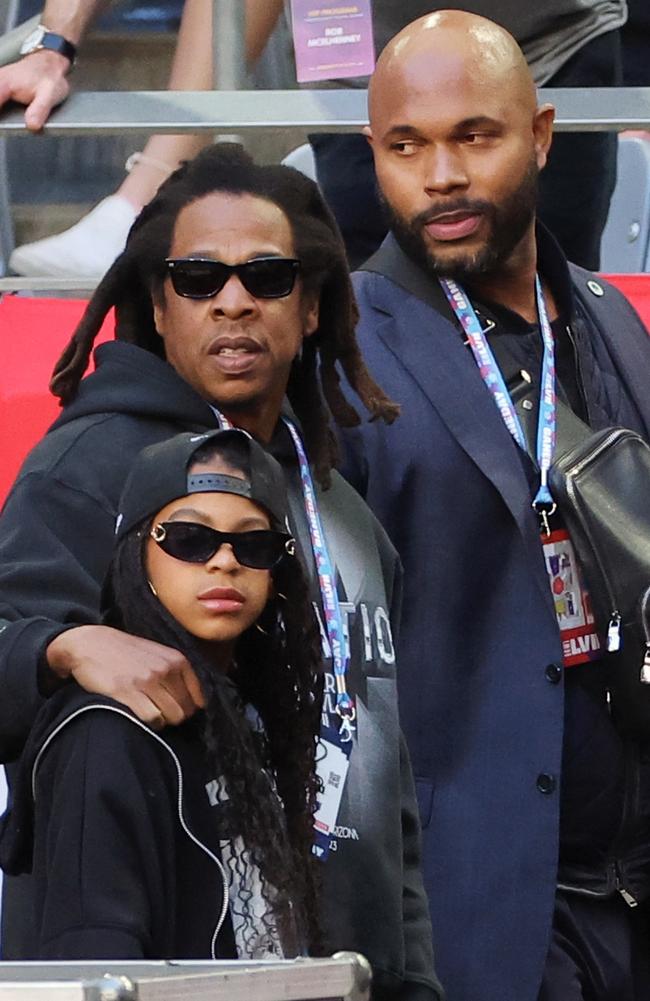 Jay-Z and Blue Ivy Carter rocked matching shades. Picture: Mike Coppola/Getty Images.