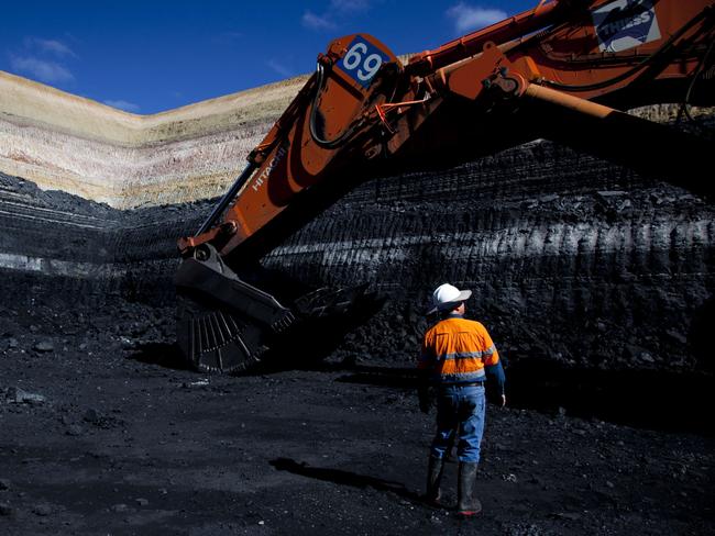 Test pit operations and inspecting the coal seams (GVK, Alpha Mine)