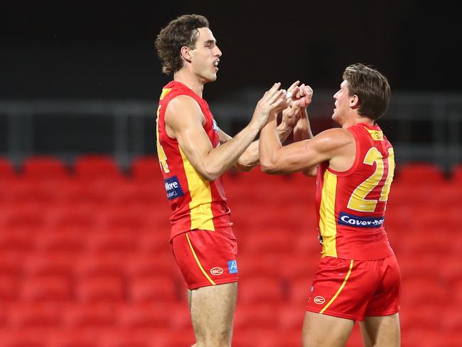 Ben King of the Suns celebrates a goal during the round 1 AFL match between the Gold Coast Suns and the Port Adelaide Power at Metricon Stadium on March 21, 2020 in Gold Coast, Australia. (Photo by Chris Hyde/Getty Images)