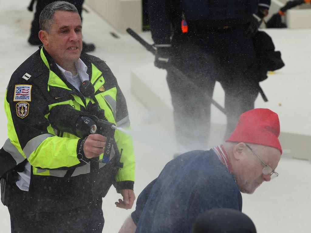 Trump supporters clash with police and security forces at the Capitol. Picture: AFP