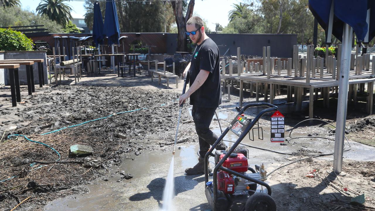 Clean-up begins at the Anglers Tavern in Maribyrnong. Picture: David Crosling