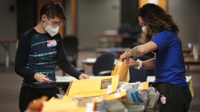 Election officials count absentee ballots in Milwaukee, Wisconsin. Wisconsin. Picture: Getty Images